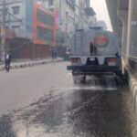 Dhaka City Corporation has started spraying water on the streets to combat pollution to air quality in the Bangladeshi capital -- BSS photo