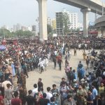 Hundreds of people flock to the scene after an air force training jet crashed on Milestone School in Uttara on Monday July 21, 2025 - Photo by Aminul Islam