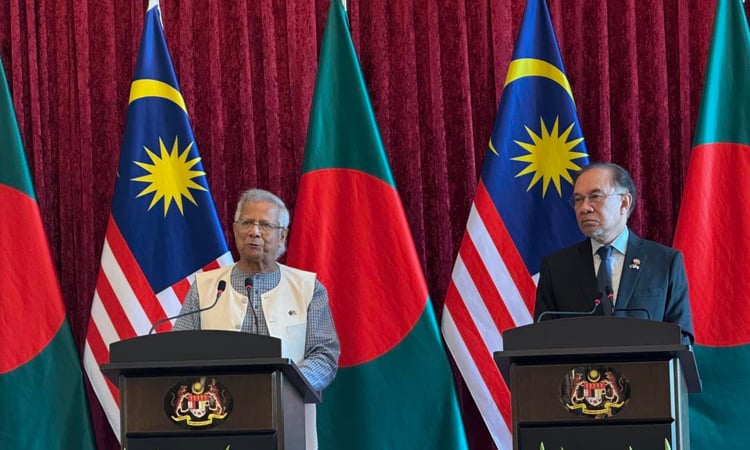 Bangladeshi chief adviser Muhammad Yunus and Malaysian Prime Minister Anwar Ibrahim address a joint press conference after their bilateral meeting in Putrajaya